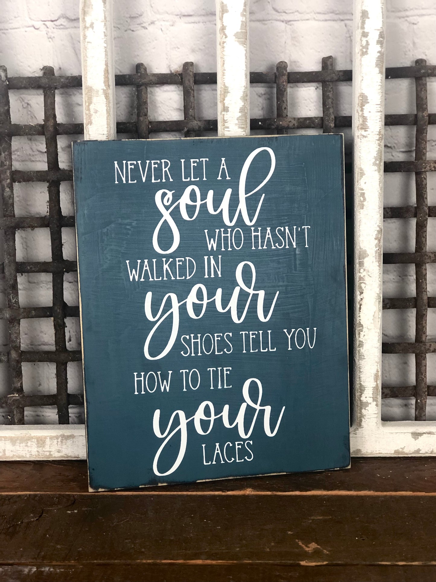 NEVER LET A SOUL WHO HASN'T WALKED IN YOUR SHOES TELL YOU HOW TO TIE YOUR LACES- WOOD SIGN