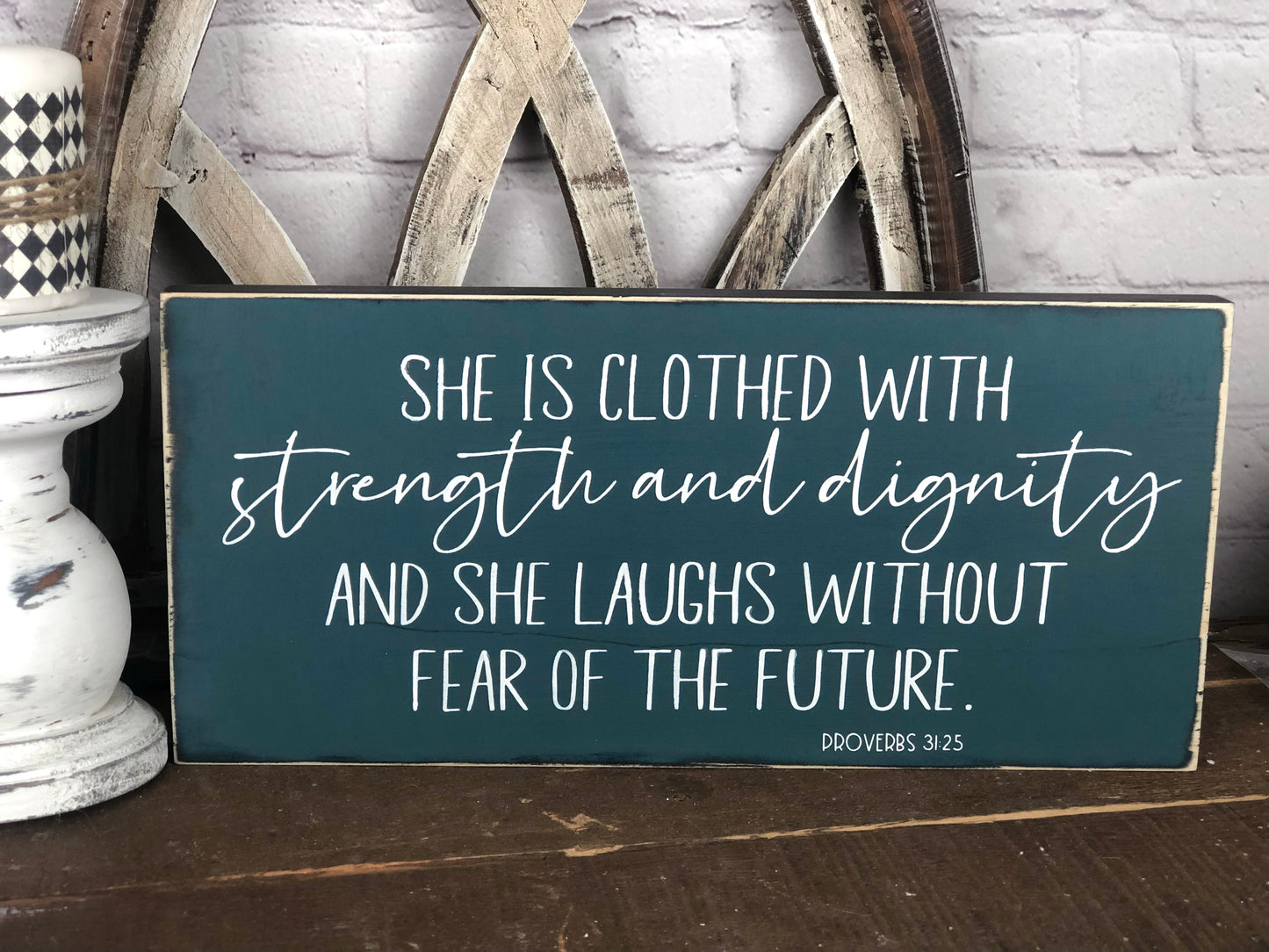 SHE IS CLOTHED WITH STRENGTH AND DIGNITY AND SHE LAUGHS WITHOUT FEAR OF THE FUTURE - WOOD SIGN